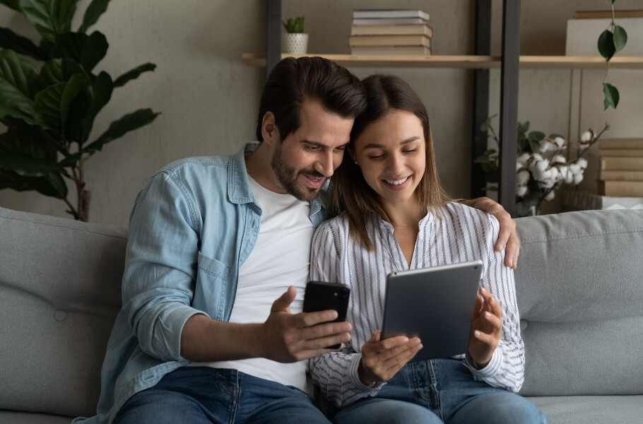 A couple using gadgets