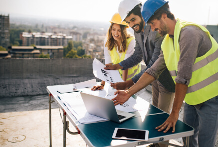 A group of engineers in construction site