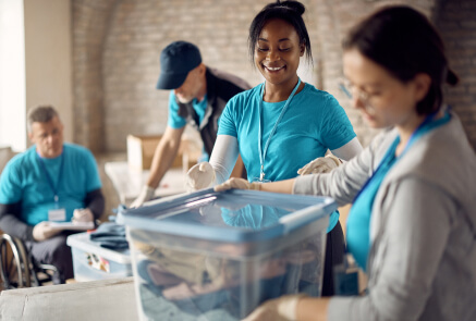 A group of volunteers is preparing donations