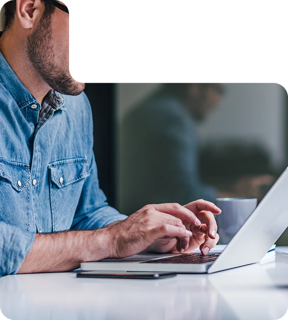 A working man using a laptop