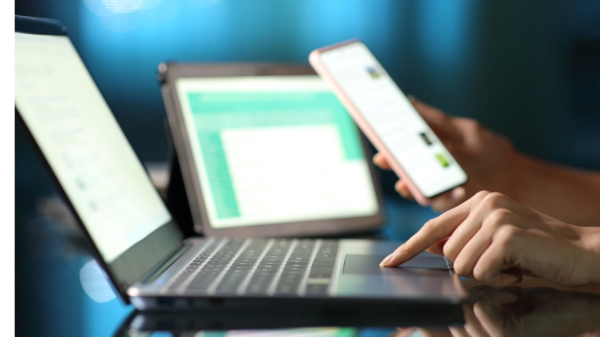 Close up portrait of a woman hand using multiple device