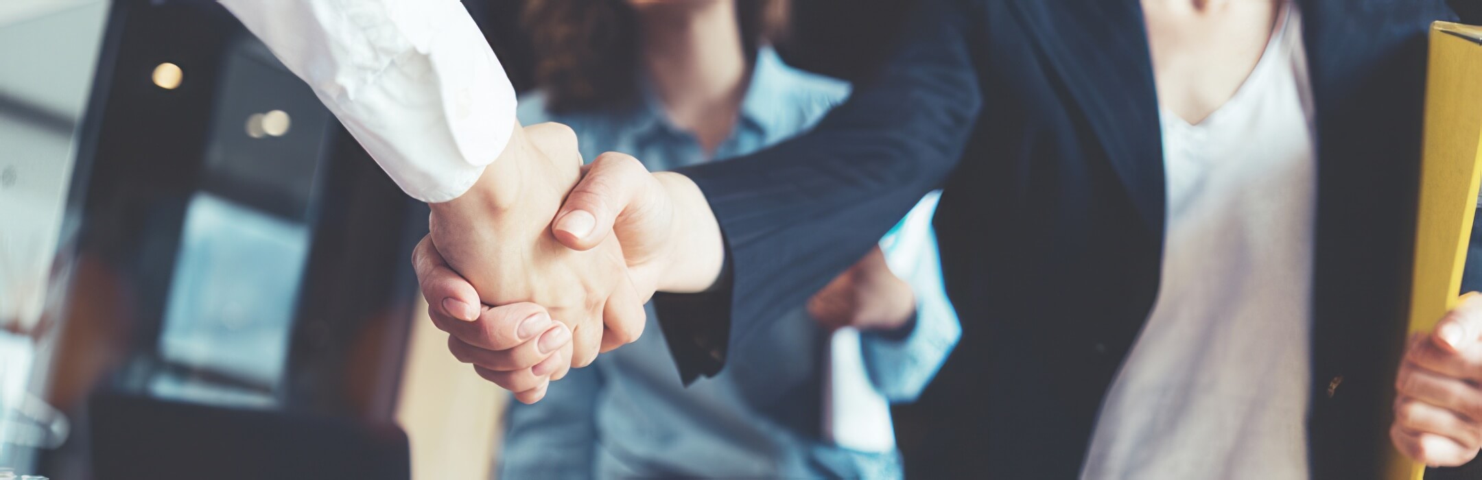 two people shaking hands