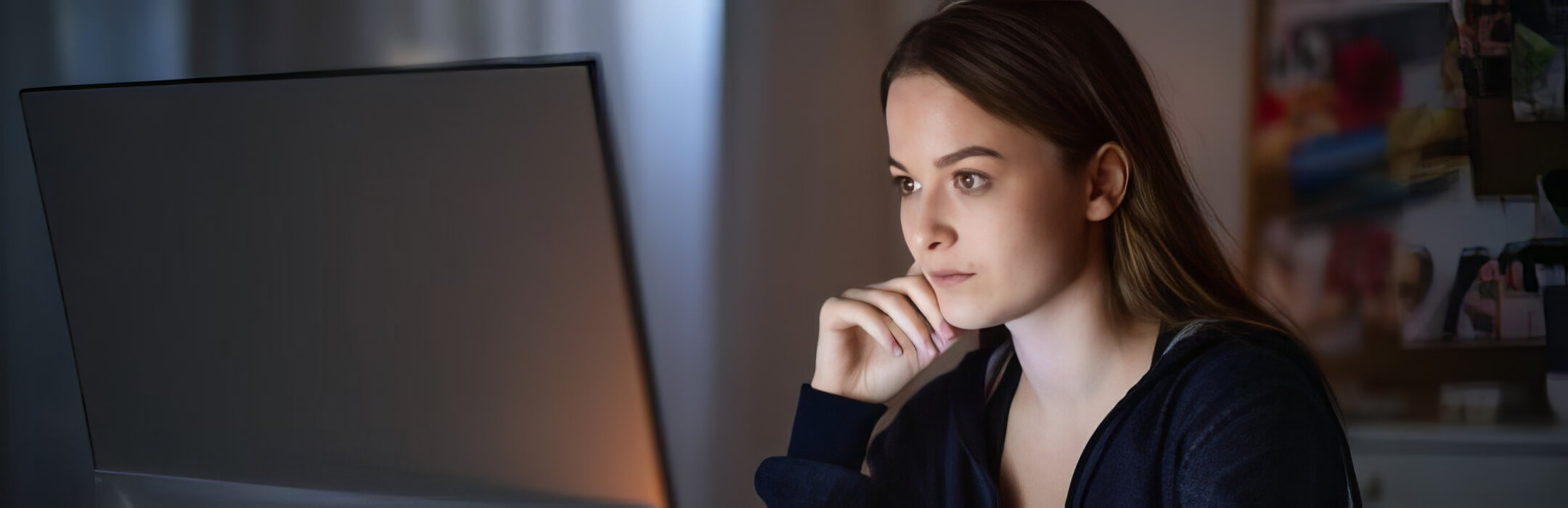 Women focus on a computer