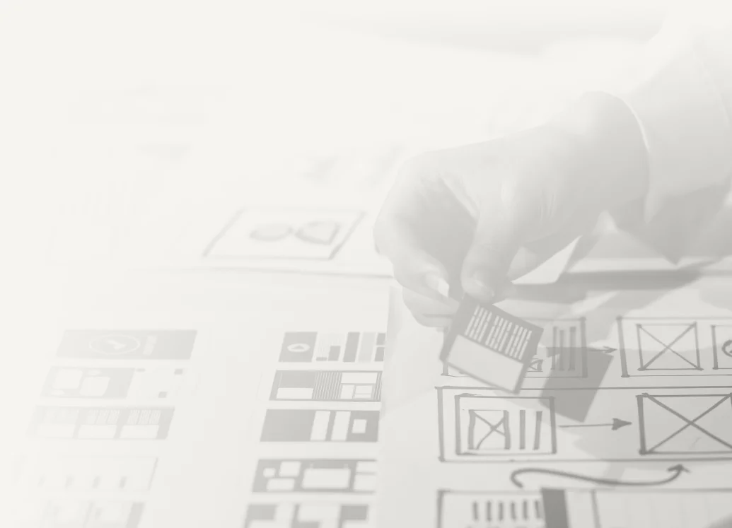 Designer sketching website wireframes