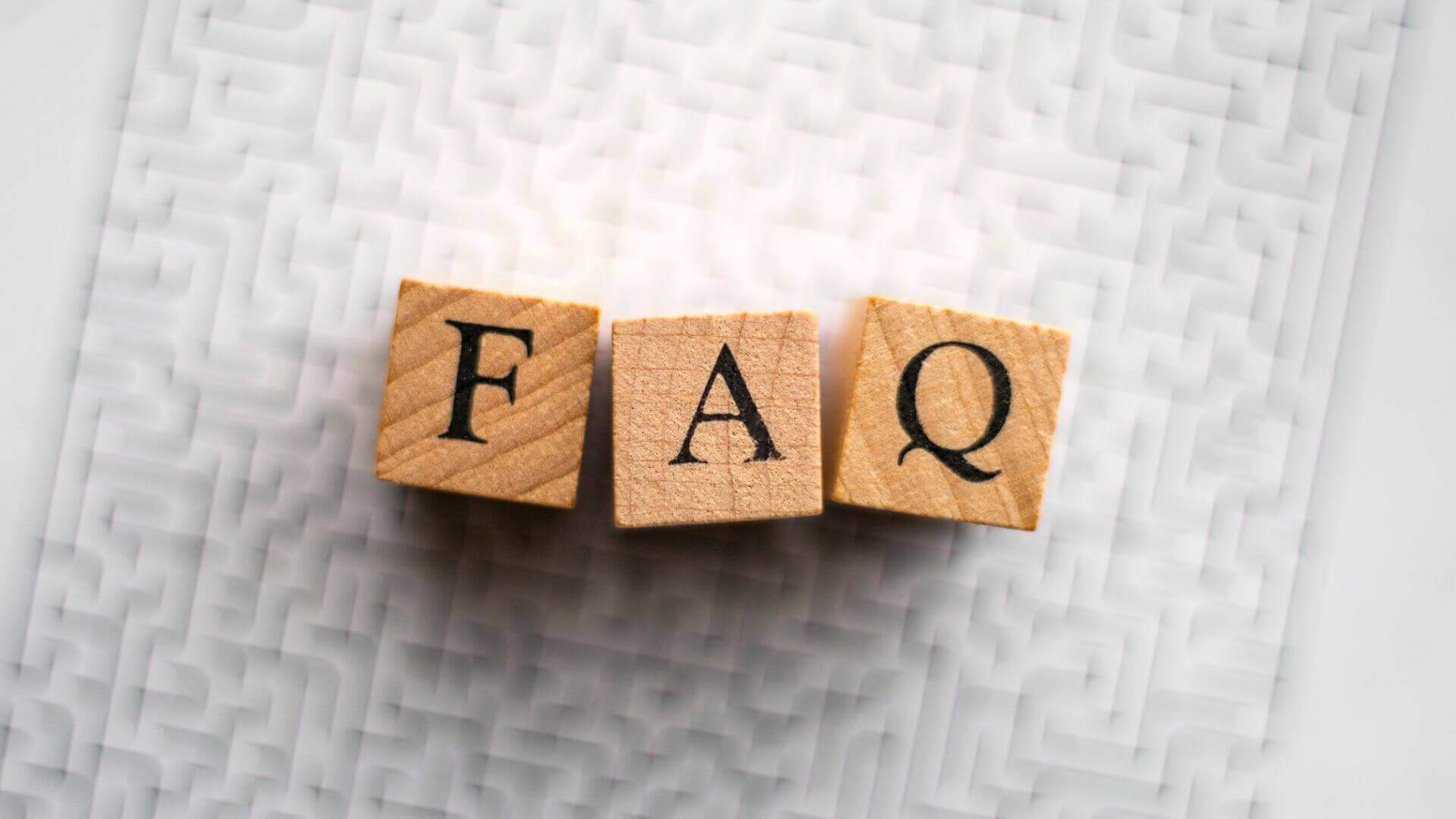 FAQ word in the block made by wood