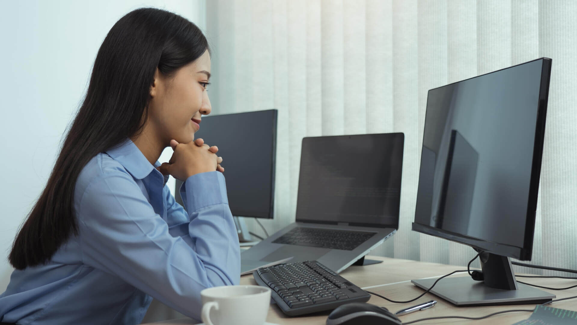 Happy women in front of computer