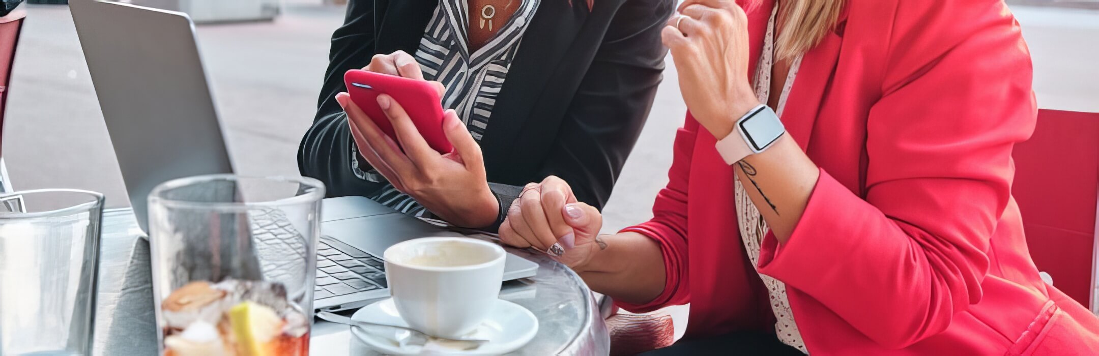 person showing her social media to her friend