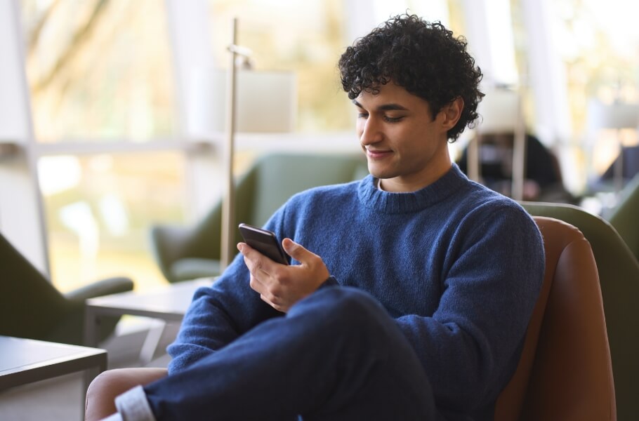 Man looking at her phone