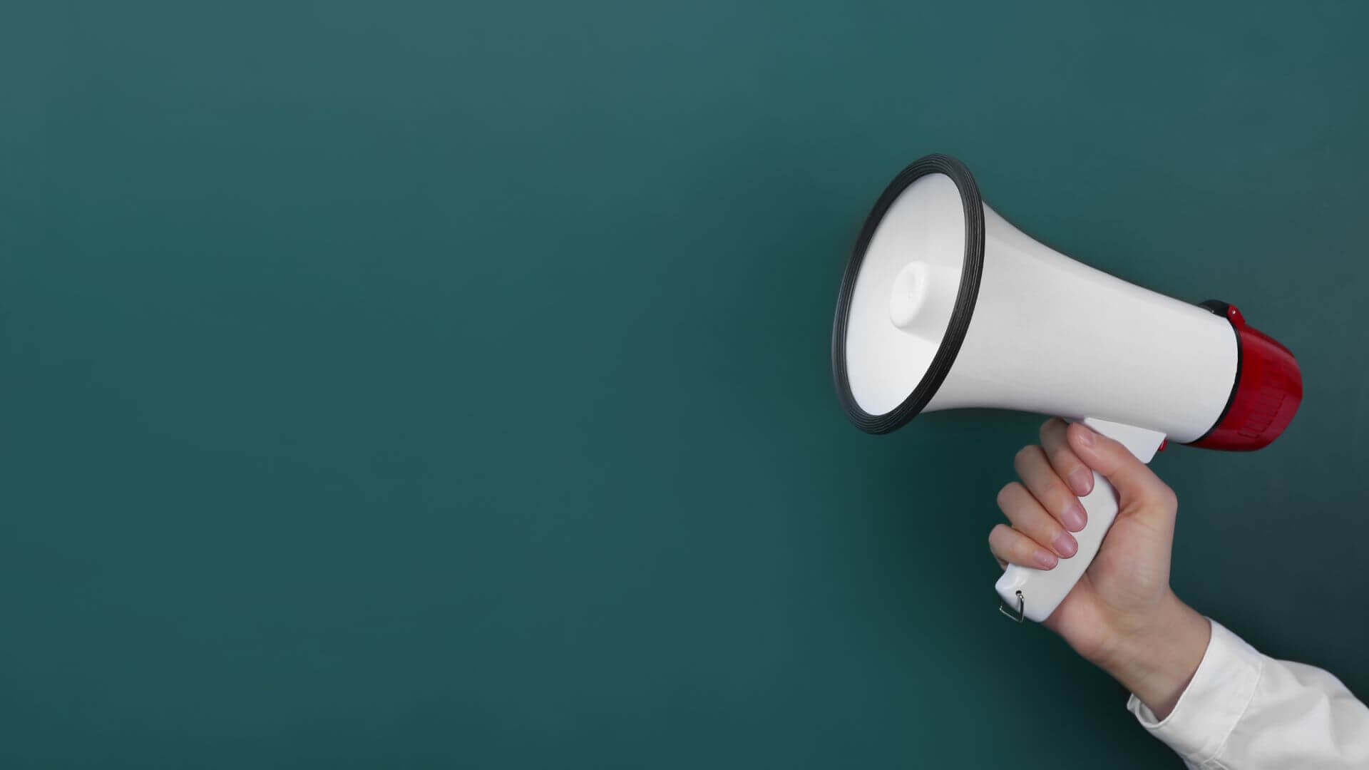 Person holding a megaphone