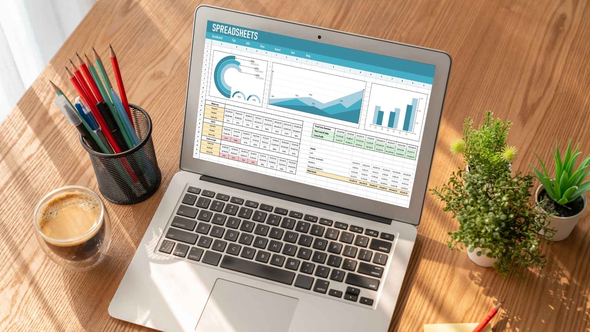 SEO tracking with sample spreadsheets on the laptop