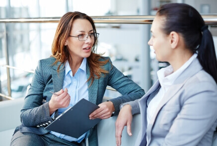 Two women talking