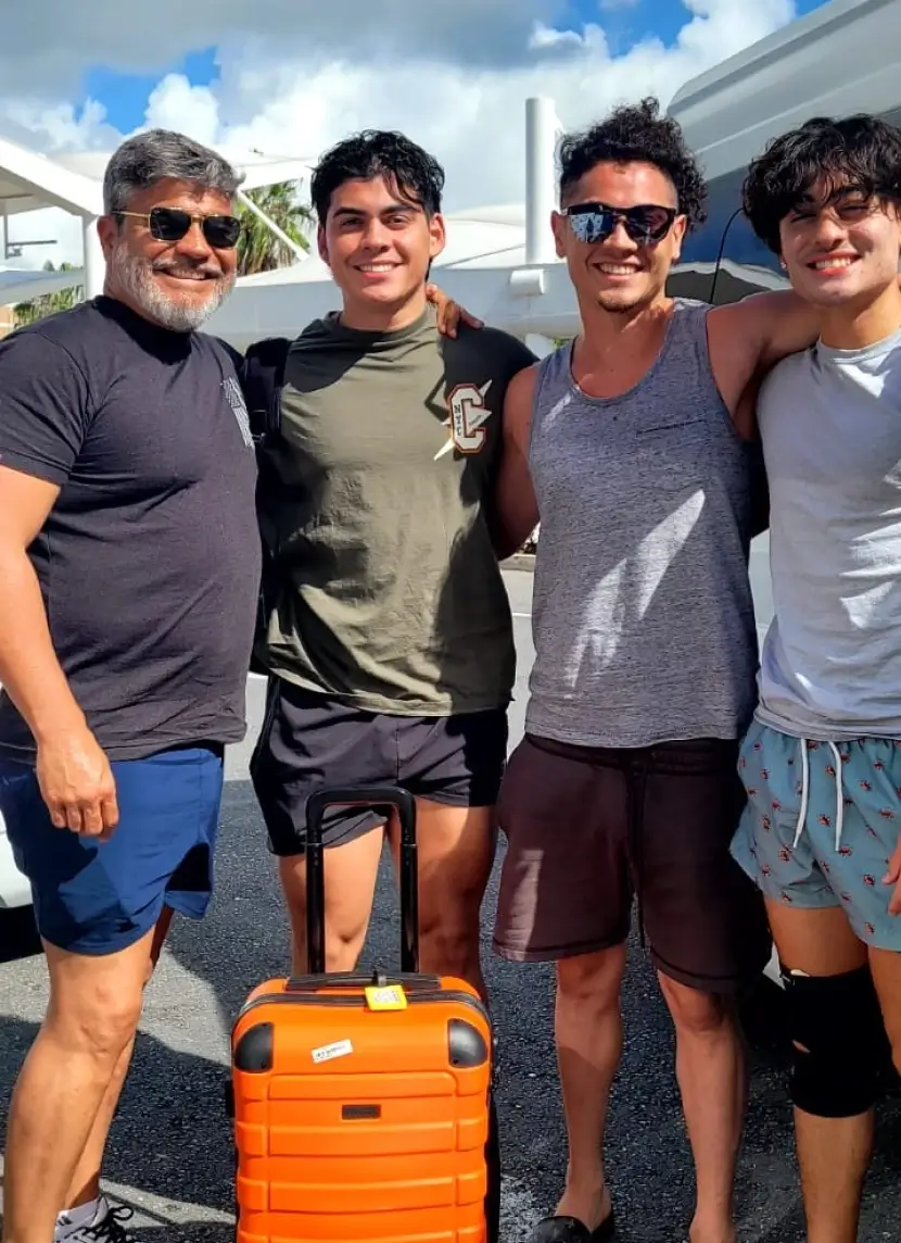 Sebastian with her brothers and father