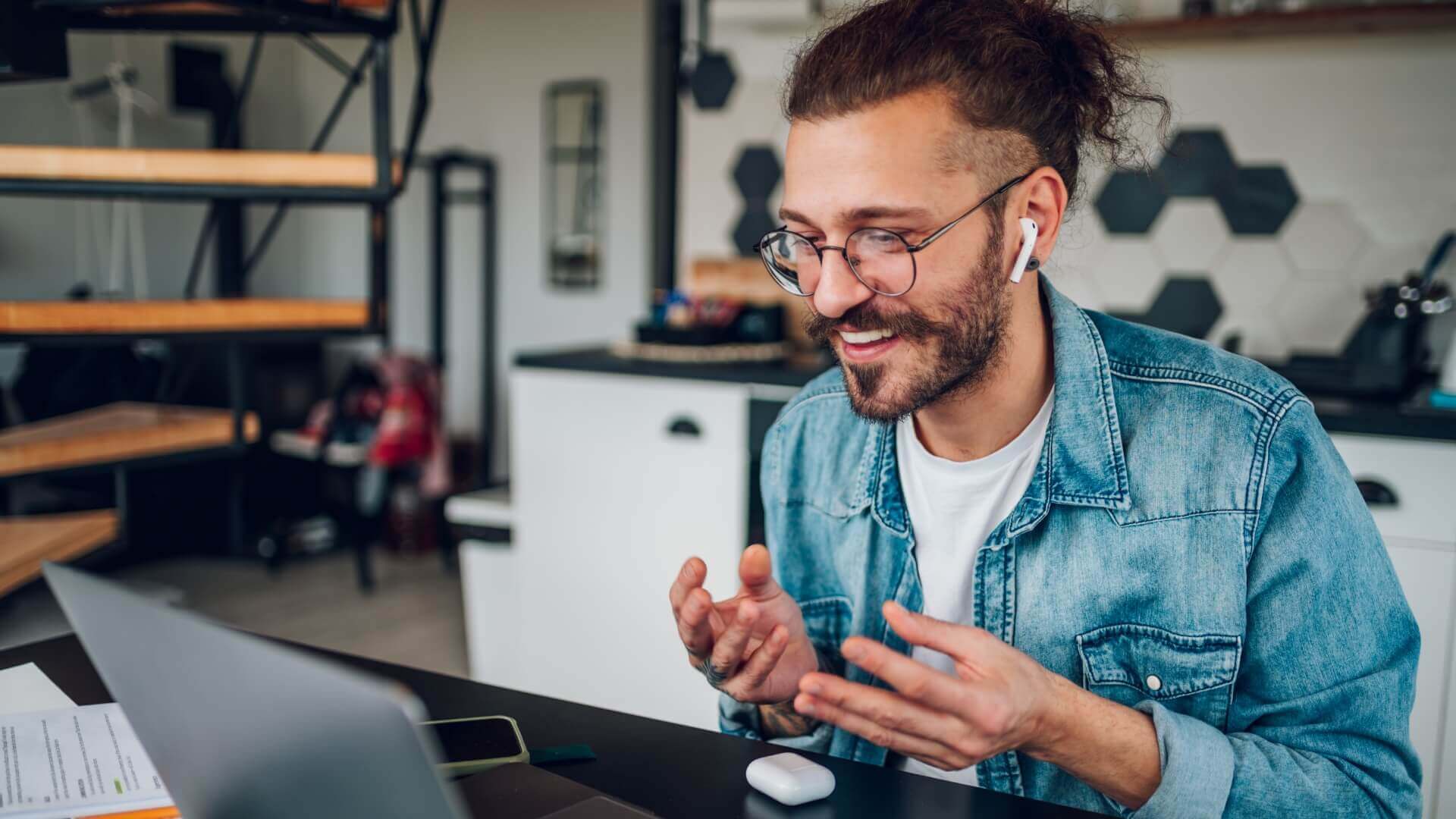 Smiling man while talking to someone