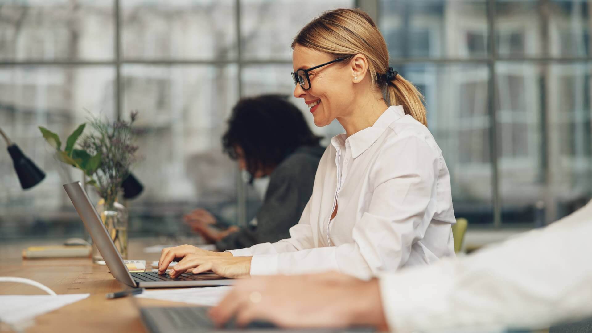 Smiling women while working