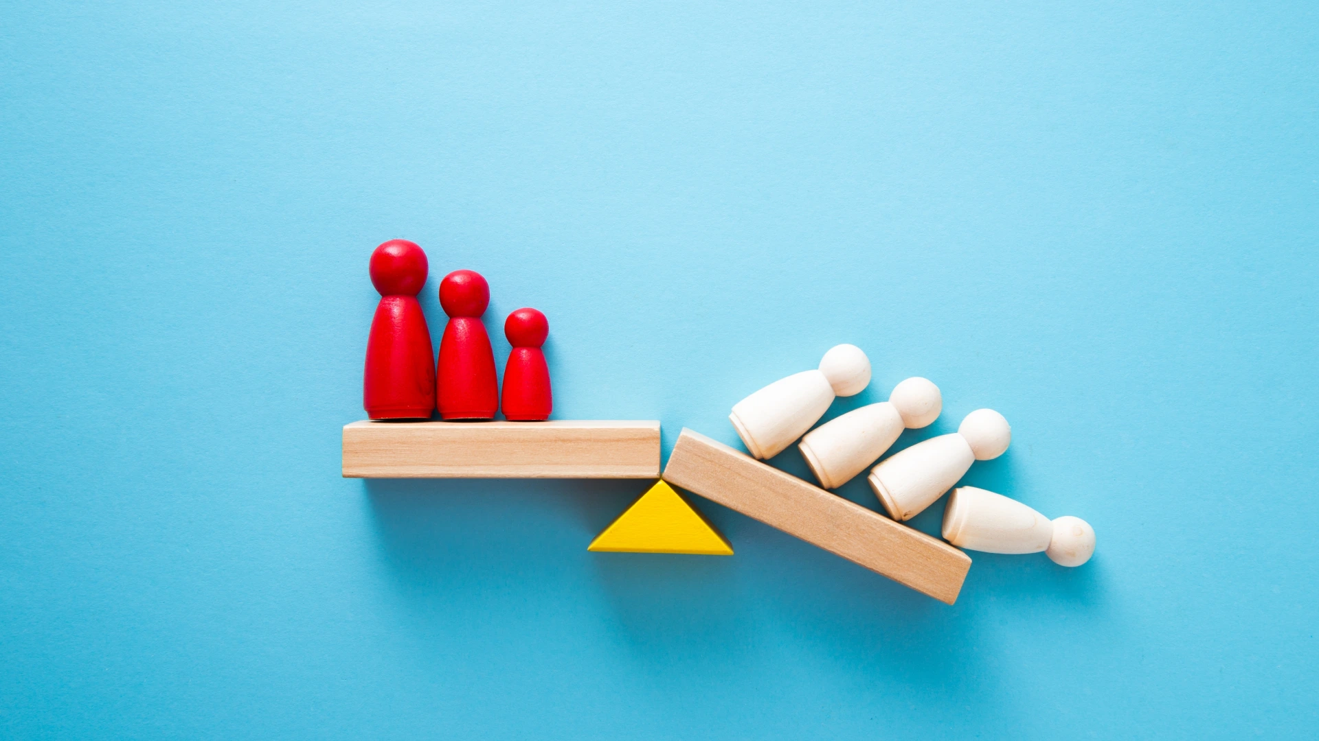 Team standing on a wooden seesaw, one side winner and one side loser. Success and failure. Business and workplace competition.