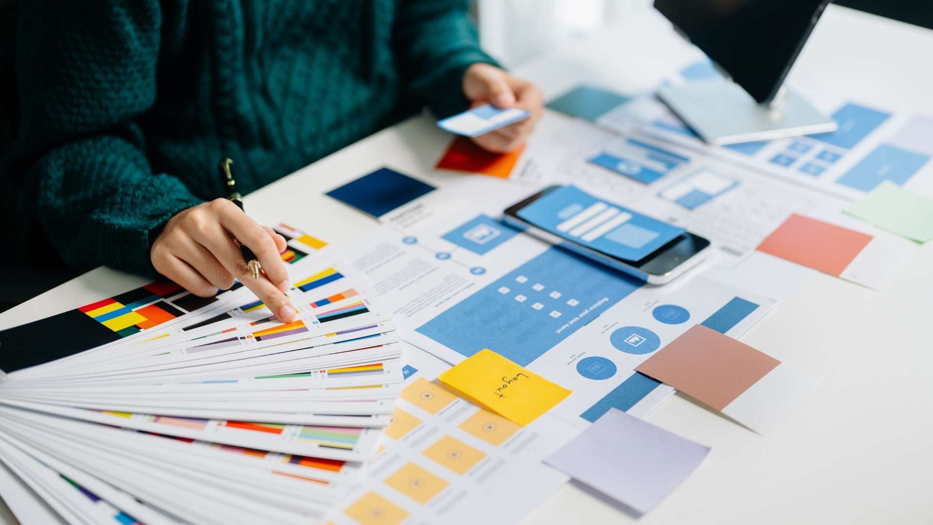 UX designer picking colors for the design