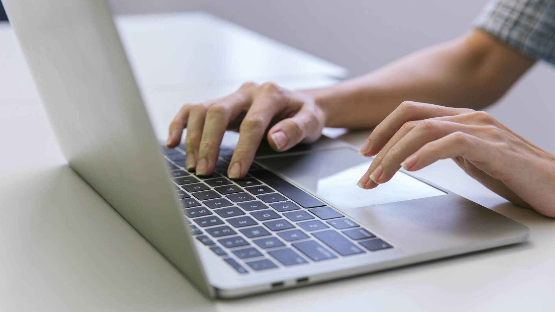 Woman hand using laptop or computor searching for information in internet online society web. Search