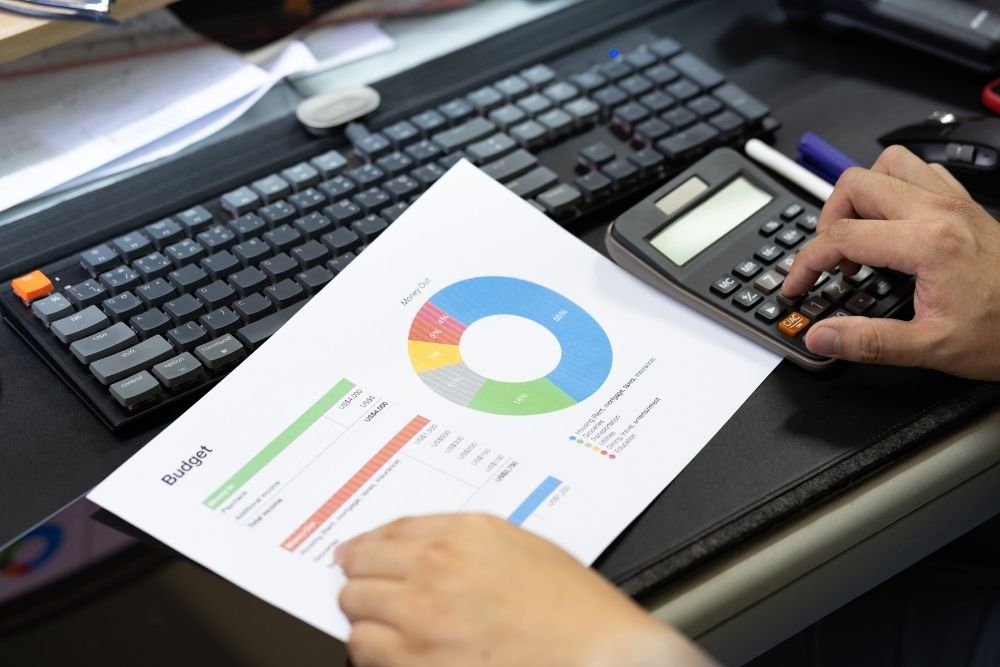a strategic advisor computing the nonprofit budget for programs