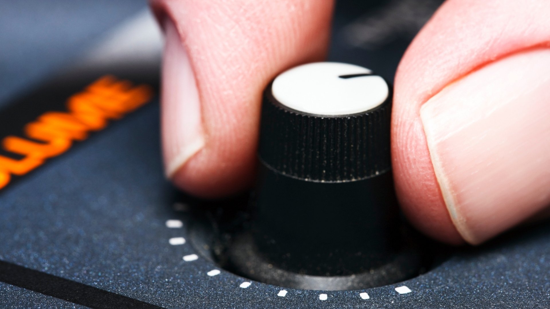 adjusting a knob
