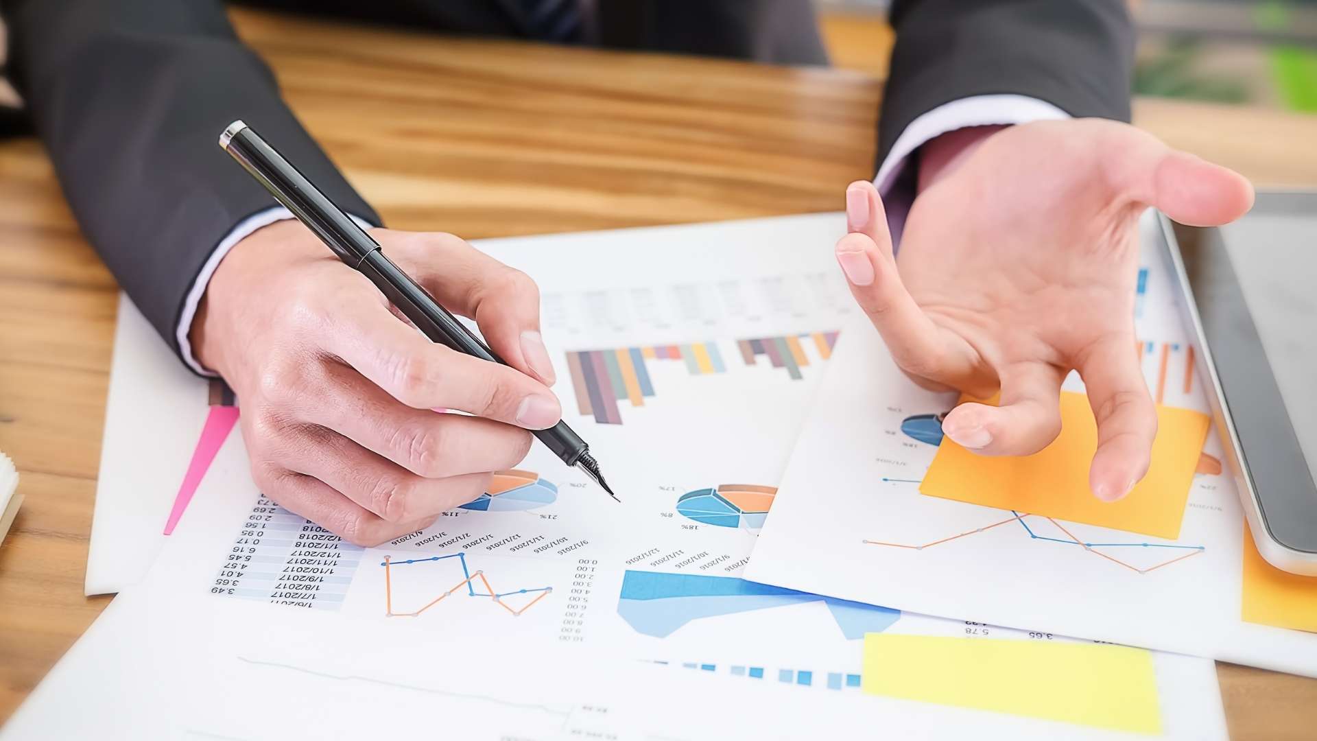 business man analyzing ROI charts