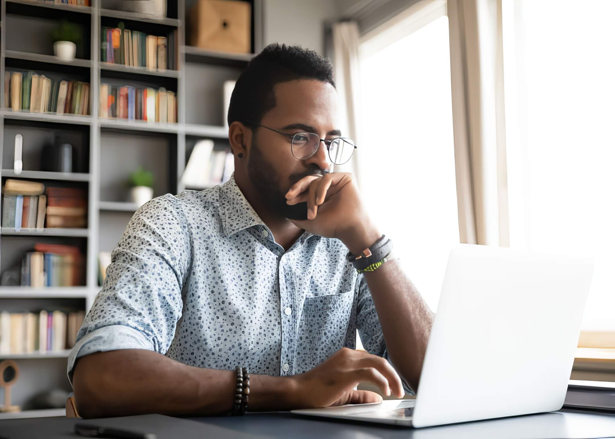 businessman thinking on how to do a full content update on his website