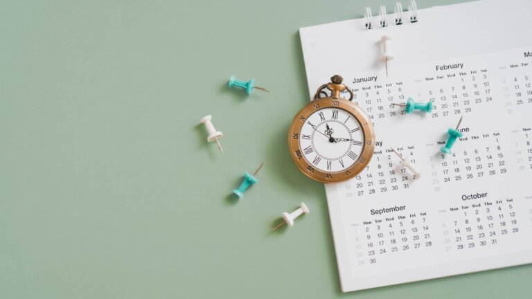 calendar and an old pocket watch