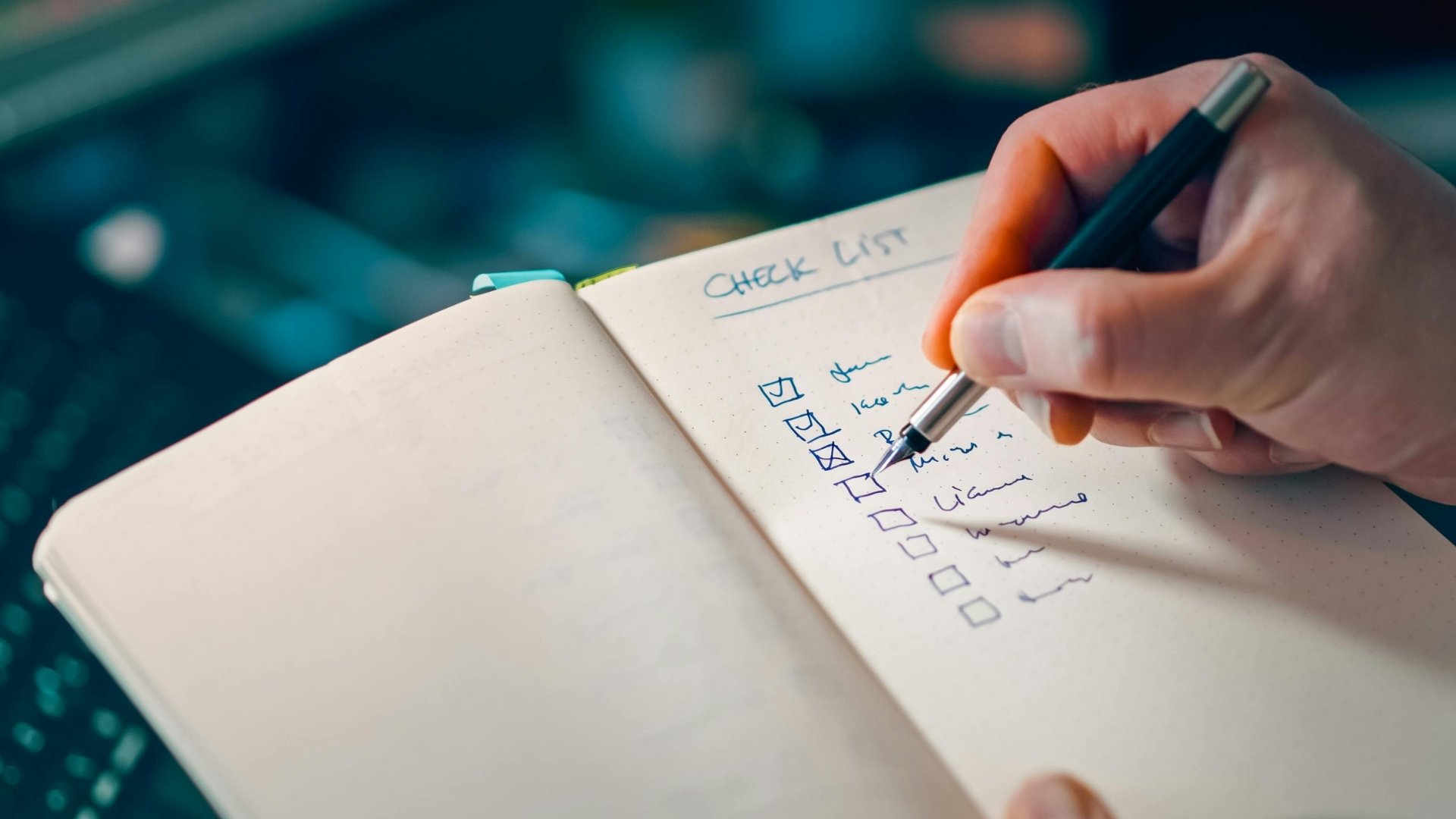 checklist written in an old notebook