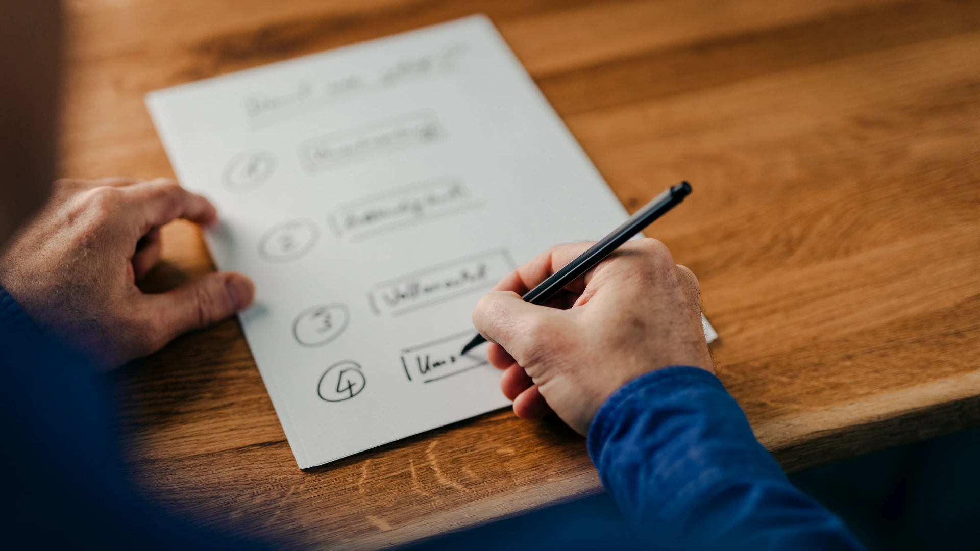 Closeup shot of a businessman writing notes