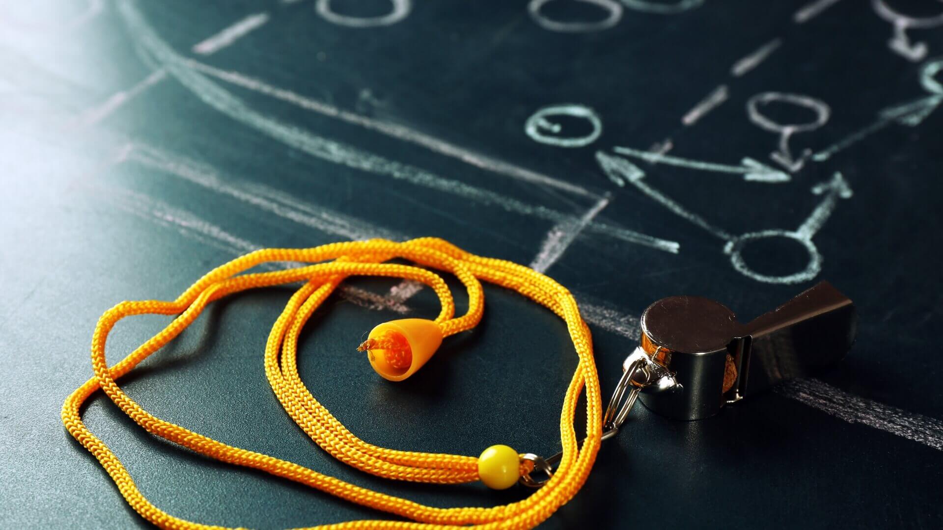 coaching board and a whistle