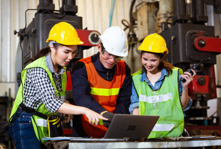 contractors looking at a laptop