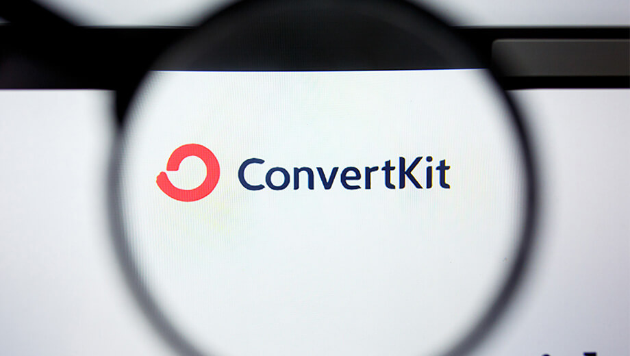 convertkit logo and magnifying glass