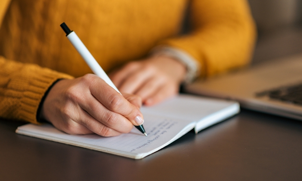 designer writing design notes