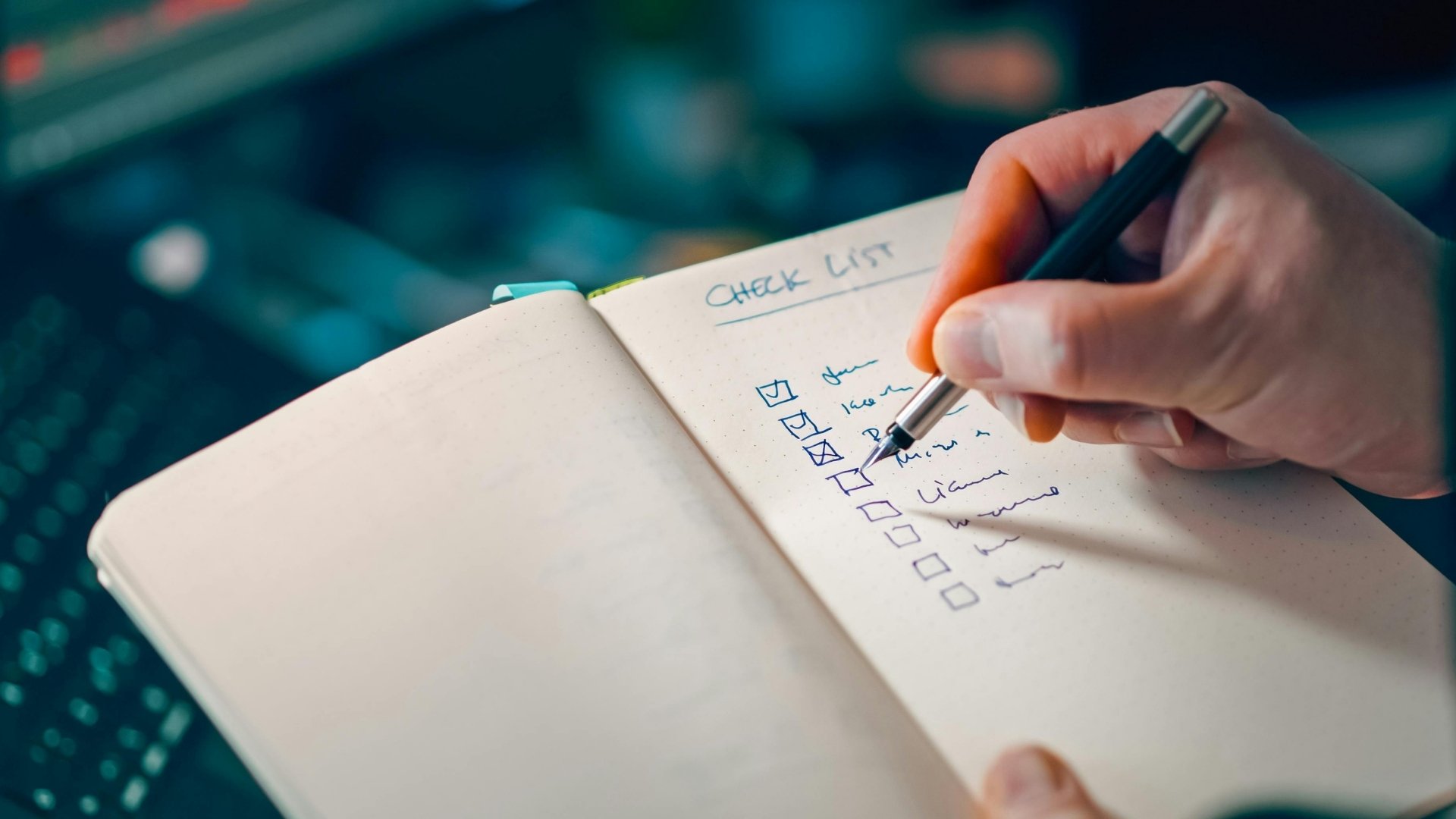 designer writing down his notes in checklist form