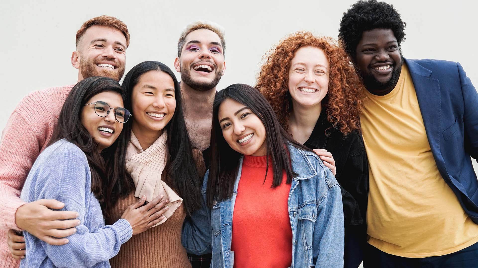 diverse-group-of-friends-having-fun-smiling-at-cam