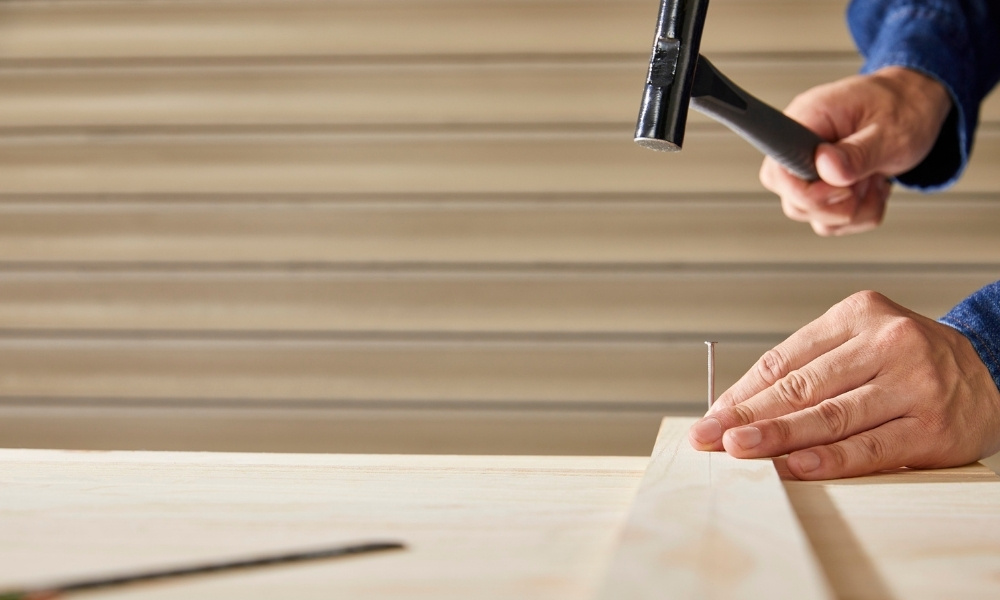 hammering a nail
