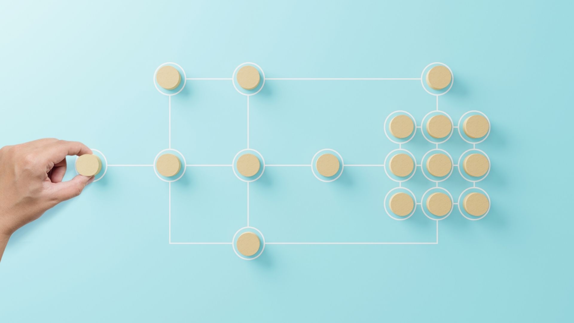 hand holding wooden cube block arranging process management