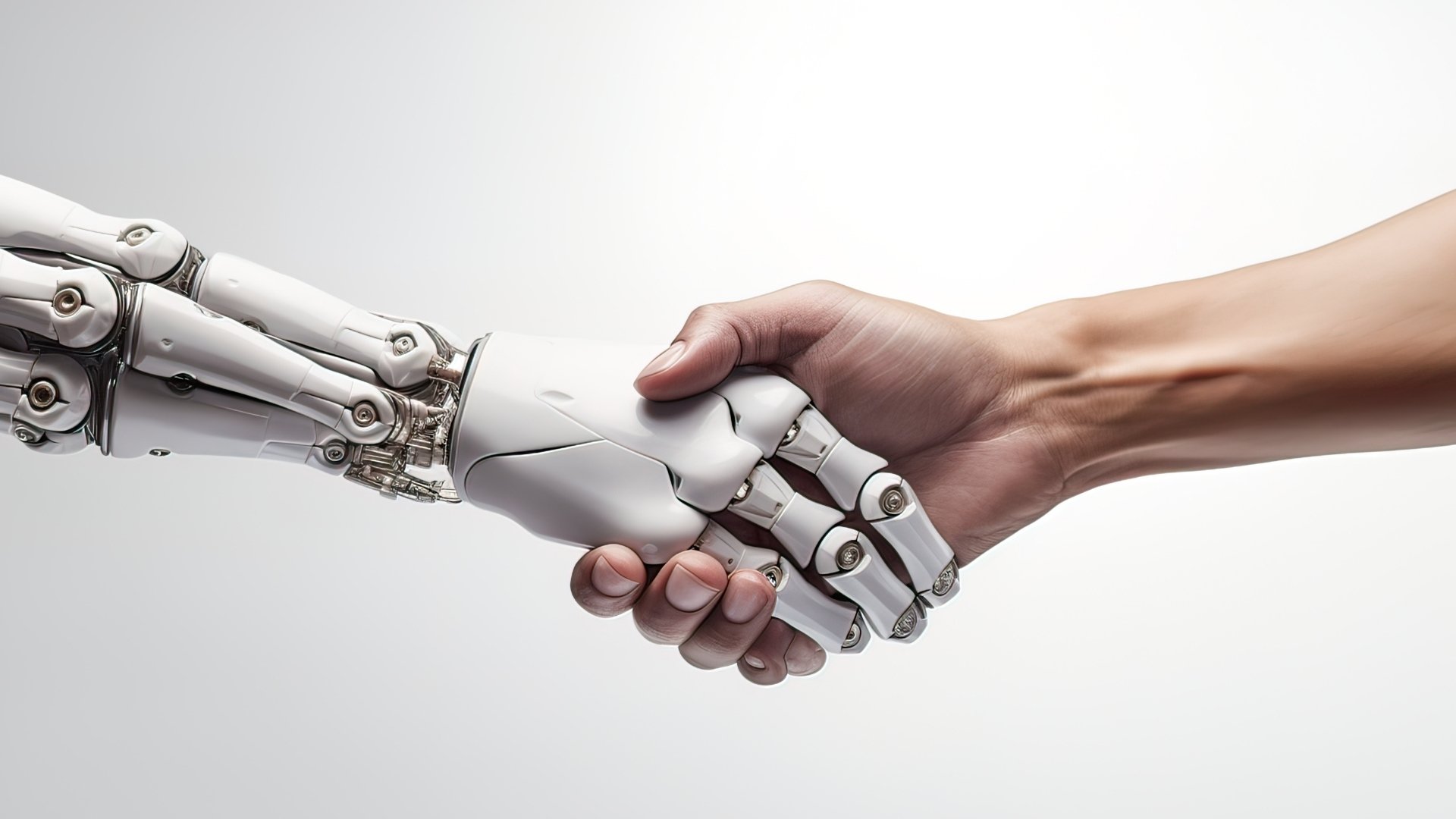 human shaking a robot hand