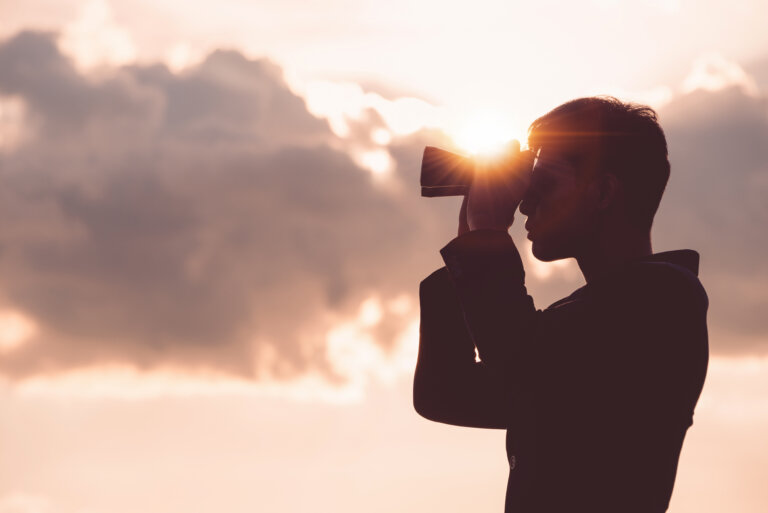 man Hand Holding Binoculars