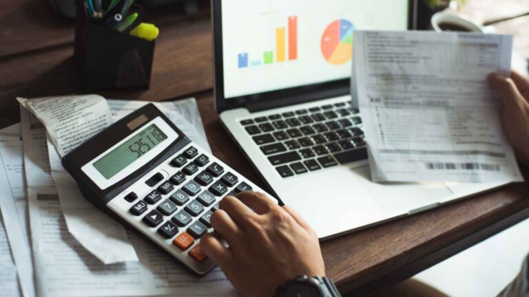 man calculating his business ROI