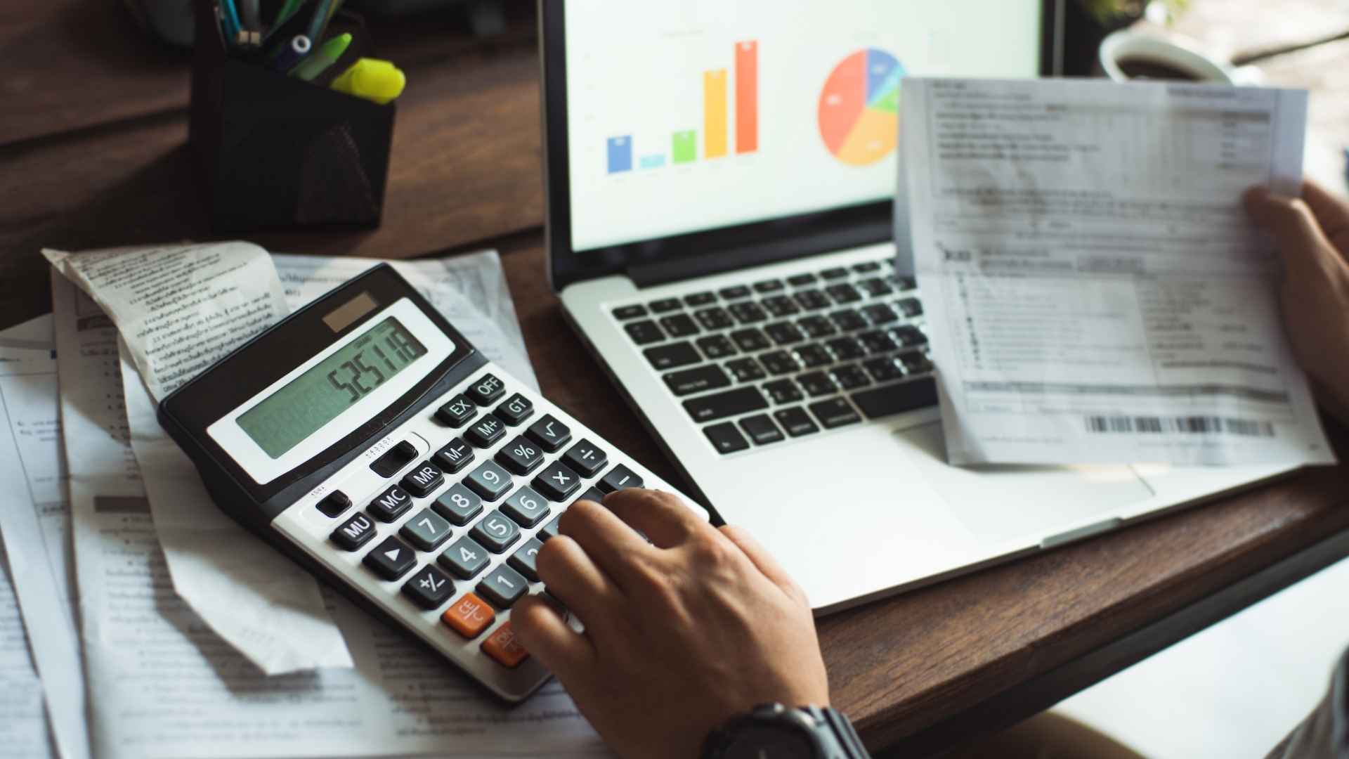 man calculating his business ROI