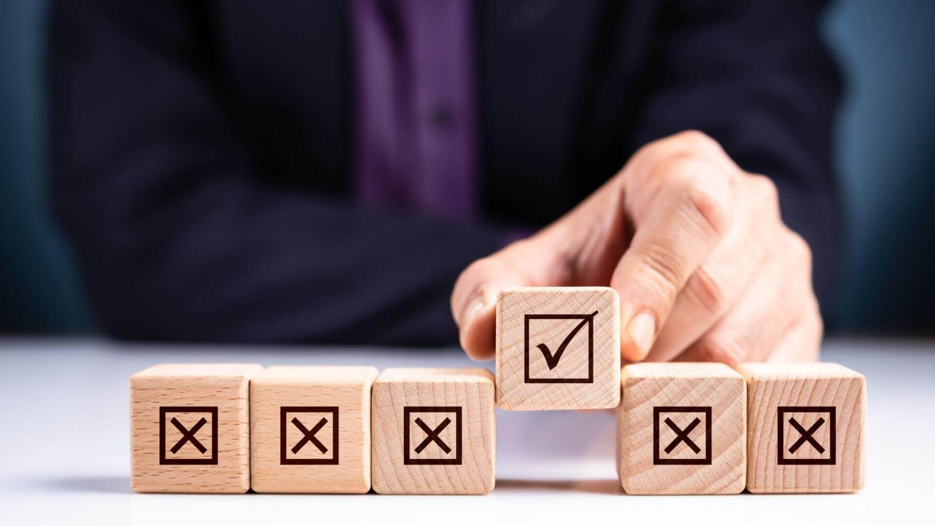 Man choosing one of the boxes