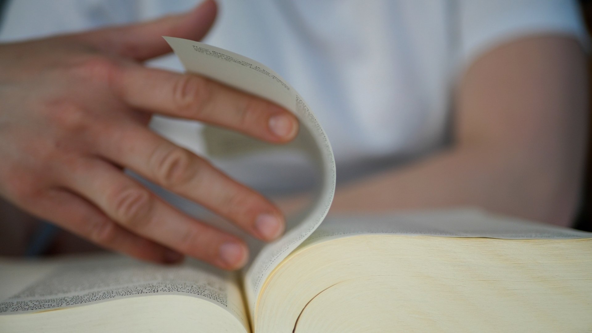 man reading a dictionary