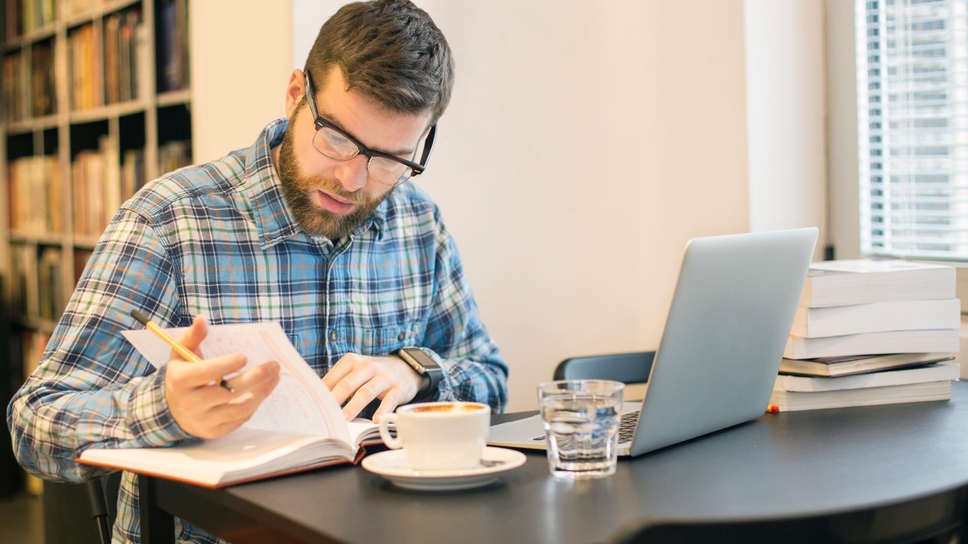 man reading notes about ai strategy