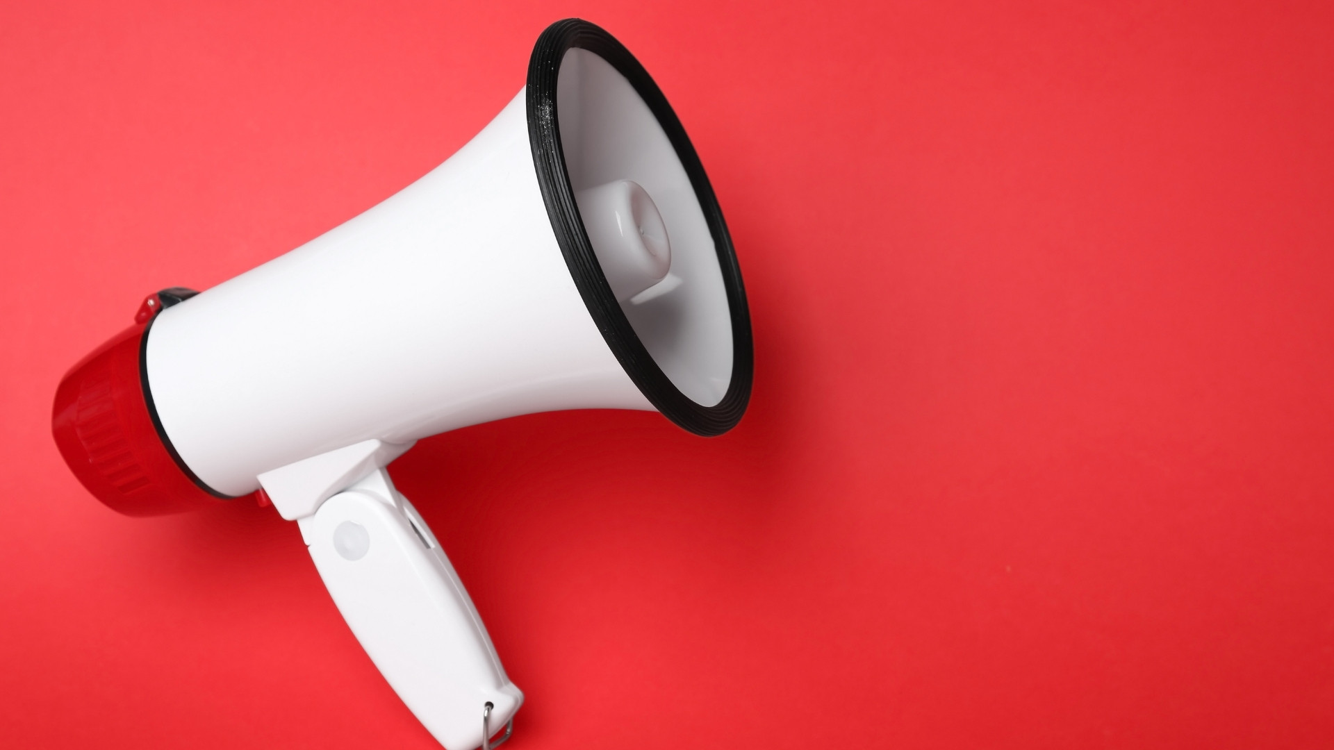 megaphone in red background