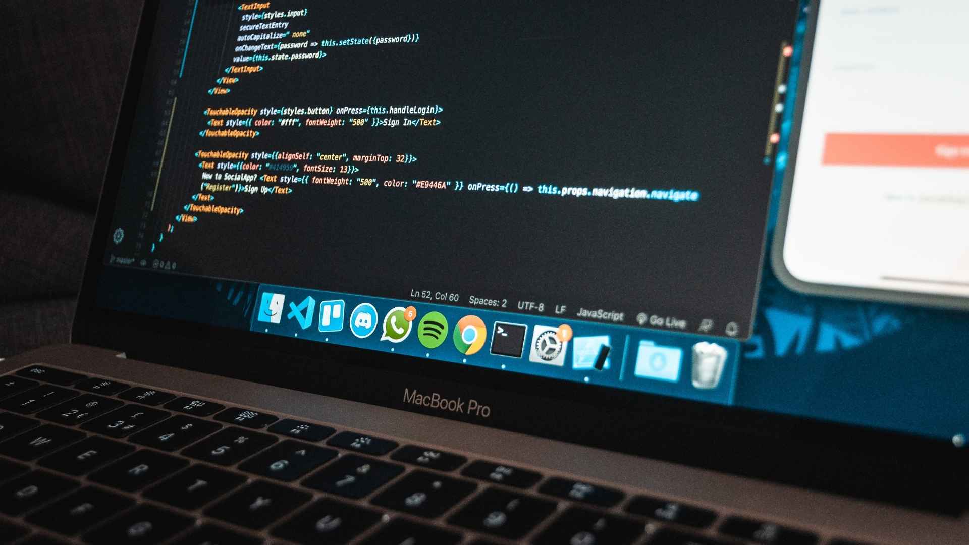 modern laptop with program code on the screen