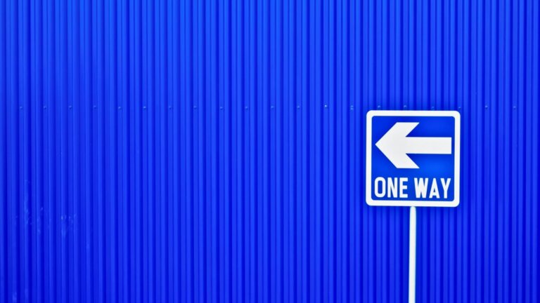 one way sign in blue background