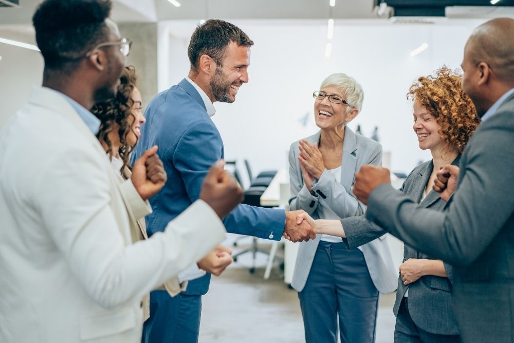 people cheering up for b2b business success