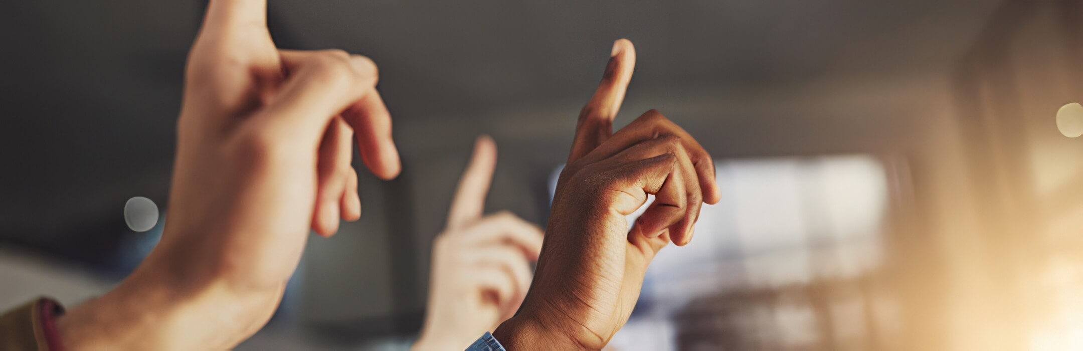 people raising hands