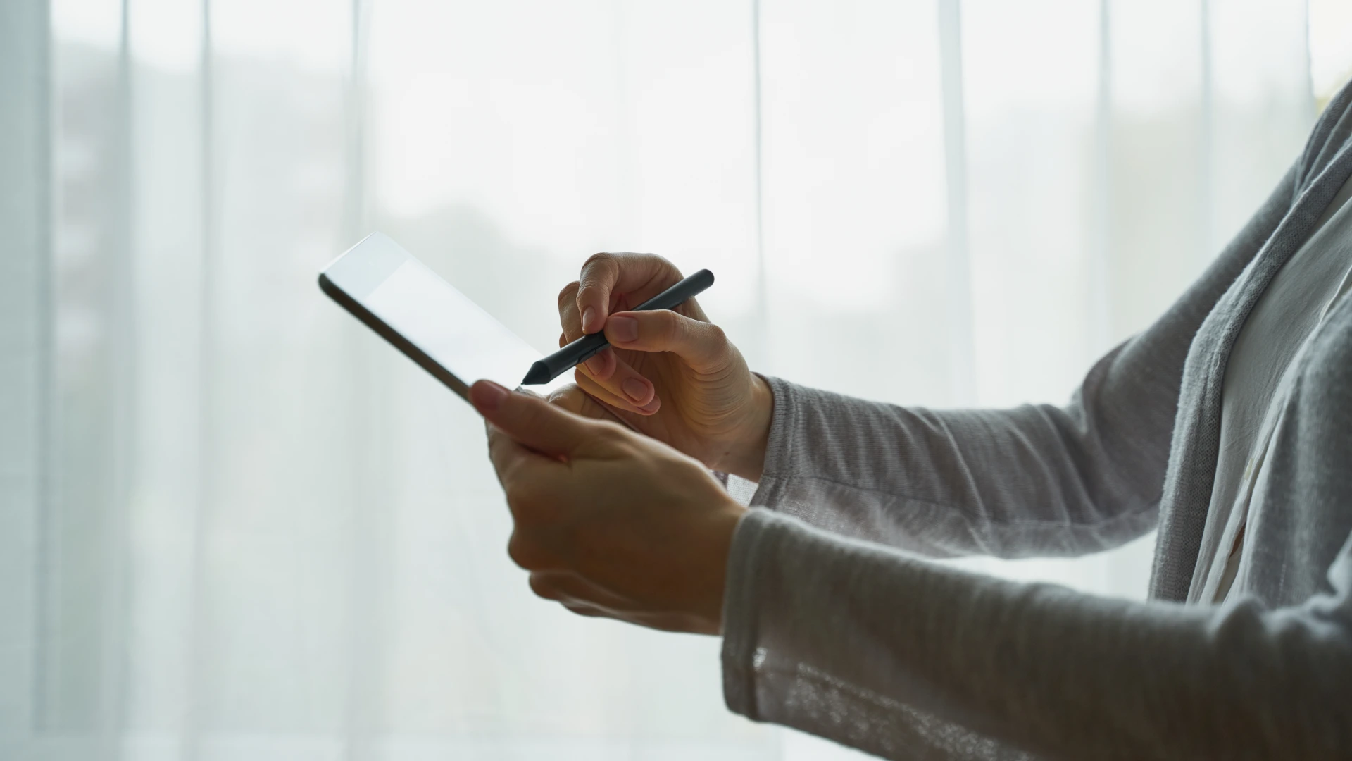 Person signing the document on device concept