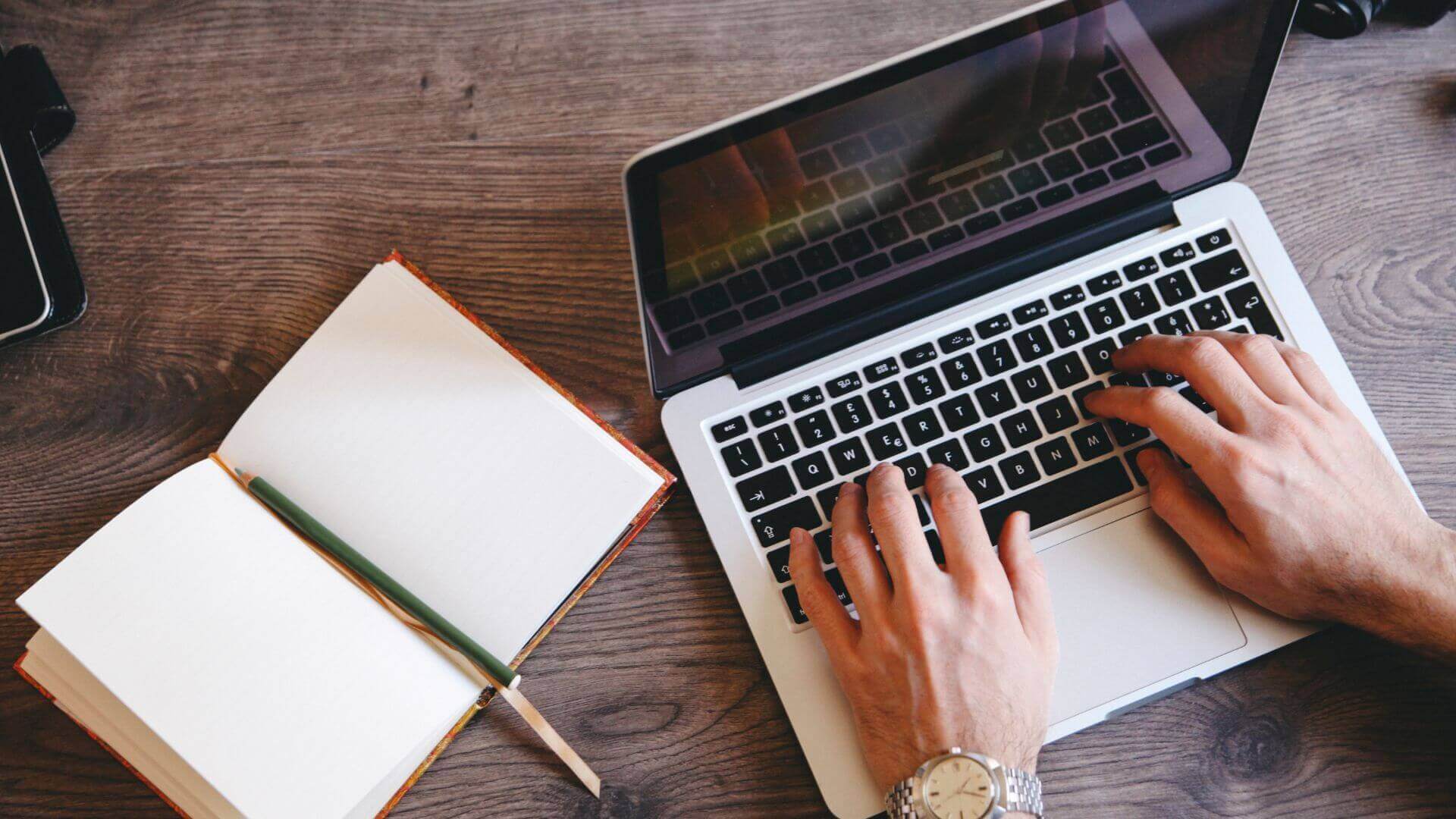 Person writing in laptop